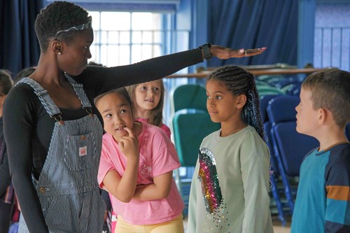 Lawrence Batley theatre Young Company tutor with Young Company members 