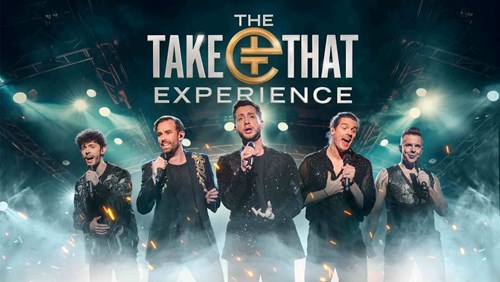 The five singers of The Take That Experience are all wearing black and singing into microphones on stage. 
